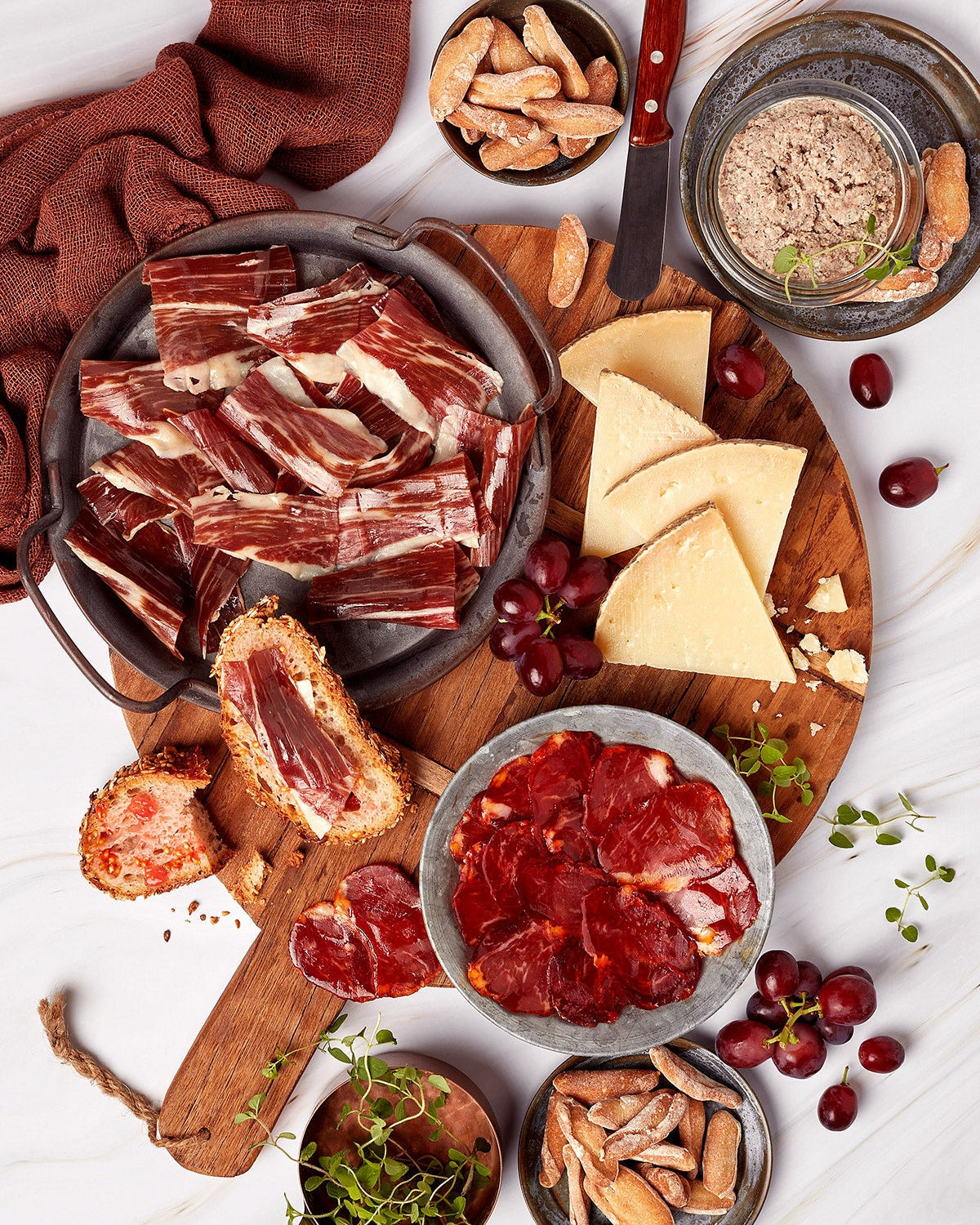 Qué regalar a una madre reciente: La cesta gourmet que realmente necesita.